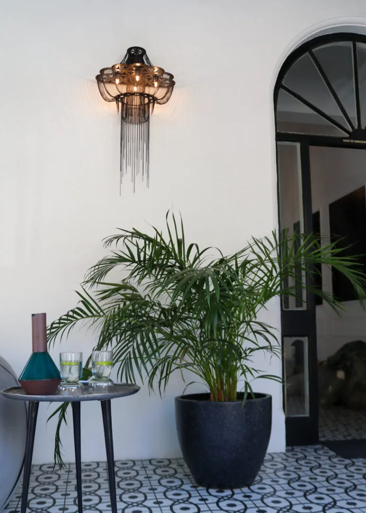 The Flower of Life wall sconce reinterpreted in black oxide