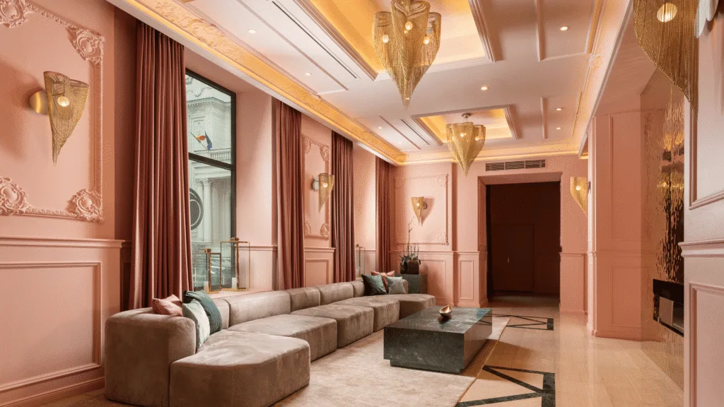 Decorative lighting in the Vision Apartments lobby with willowlamp Big Love Clover chandeliers and matching wall sconces.