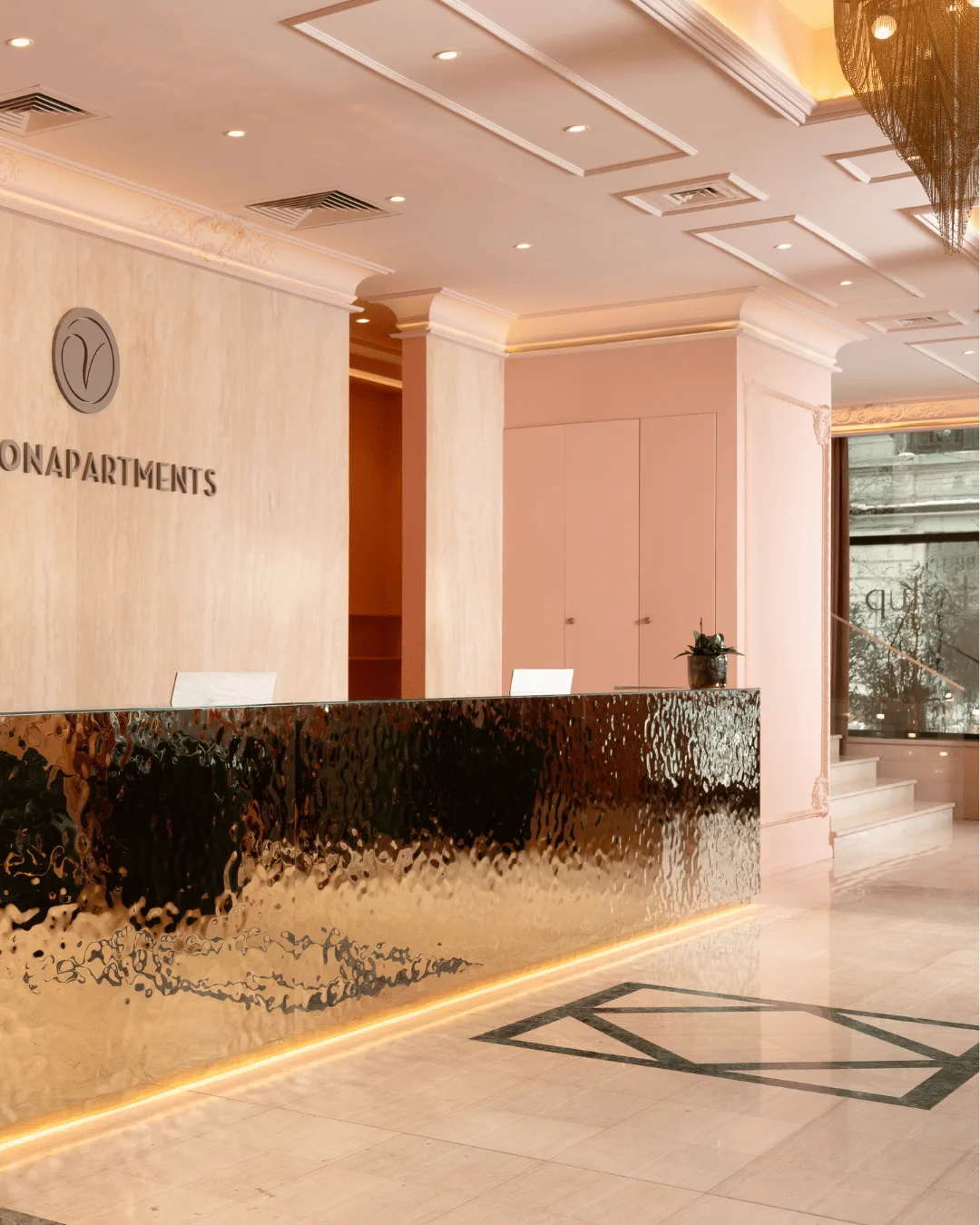 Big Love Clover Chandelier by willowlamp luxury lighting atelier featured in the lobby of Vision Apartments in Bucharest